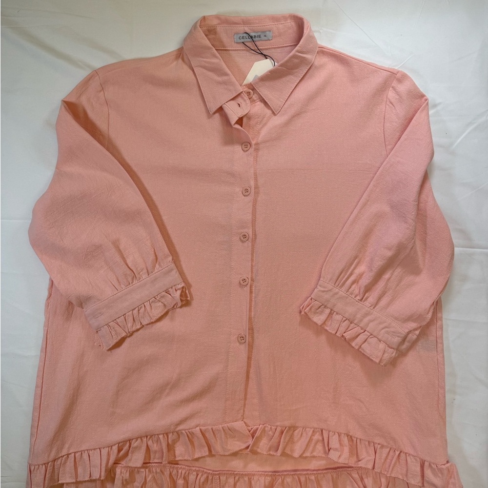 Women’s Light‎ Pink Blouse with Ruffle Trim on sleeves and bottom. SizeXL.